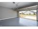 Garage featuring an open door, with a view of the house and street outside at 1007 Fairhaven Dr, Mebane, NC 27302