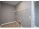 Laundry room with tiled floor and hookups, ready for appliances and convenience at 1007 Fairhaven Dr, Mebane, NC 27302