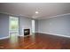 Bright living room featuring a fireplace and neutral wall color at 1007 Fairhaven Dr, Mebane, NC 27302