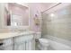 Cozy bathroom includes a single vanity, shower-over-tub, and decorative mirror at 1009 Linenhall Way, Wake Forest, NC 27587