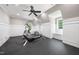 Bright exercise room equipped with modern fitness equipment and a ceiling fan at 1009 Linenhall Way, Wake Forest, NC 27587
