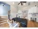 Spacious home office featuring custom cabinetry, a built-in desk, and natural light at 1009 Linenhall Way, Wake Forest, NC 27587
