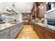 Chef's kitchen with professional-grade appliances, granite countertops, and ample cabinet space at 1009 Linenhall Way, Wake Forest, NC 27587