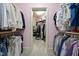 Functional walk-in closet with custom shelving provides ample storage for clothing and accessories at 1009 Linenhall Way, Wake Forest, NC 27587