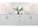 Bathroom featuring a dual sink vanity with modern fixtures and ample counter space at 109 S Plum St, Durham, NC 27703