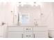 Bathroom featuring dual sinks, quartz counters, and clean fixtures at 109 S Plum St, Durham, NC 27703
