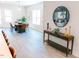 Living room with a dining table, hardwood floors, and stylish decor at 109 S Plum St, Durham, NC 27703
