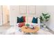 Bright living room features contemporary decor, modern furnishings, and a stylish area rug at 109 S Plum St, Durham, NC 27703