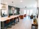 Open-concept living space features modern decor, stylish furniture, and a seamless flow between kitchen, living, and dining areas at 109 S Plum St, Durham, NC 27703