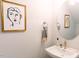 Charming powder room features modern decor, a stylish mirror, and elegant fixtures at 109 S Plum St, Durham, NC 27703