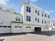 Exterior view of the garage side of the townhome at 11549 Helmond Way # 103, Raleigh, NC 27617