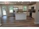 Bright eat-in kitchen with stainless steel appliances and a large island for extra counter space at 1165 John Mitchell Rd, Youngsville, NC 27596