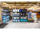 Clean basement with organized storage, shelving, and vapor barrier on the floor, ready for your storage needs at 12 Innisfree Dr, Durham, NC 27707