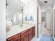 Cozy bathroom featuring a vanity with wooden cabinets, natural lighting, and a serene atmosphere at 12 Innisfree Dr, Durham, NC 27707