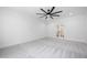 Bright bedroom with a ceiling fan and a view to another room through the glass doors at 1222 Red Cedar Ct, Youngsville, NC 27596