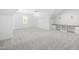 Bright bonus room with built in shelves and storage for a customized home office or play area at 1222 Red Cedar Ct, Youngsville, NC 27596