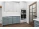 Well-equipped kitchen with stainless steel appliances, custom cabinets, and modern lighting at 1222 Red Cedar Ct, Youngsville, NC 27596