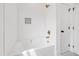 Shower and tub combo with white subway tile and bronze fixtures, providing a modern and elegant design at 1222 Red Cedar Ct, Youngsville, NC 27596