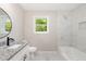 Bathroom with a granite vanity, modern fixtures, and a shower over tub at 124 Strickland Dr, Smithfield, NC 27577
