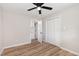 Bedroom featuring wood-look floors and a double closet with doors at 124 Strickland Dr, Smithfield, NC 27577