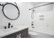 Bathroom featuring modern vanity with basin sink, framed mirror, and shower over tub at 1301 Tawny View Ln, Raleigh, NC 27603