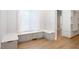 Inviting window seating with storage, ideal for relaxing and enjoying natural light at 1301 Tawny View Ln, Raleigh, NC 27603