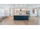 A spacious kitchen with a large island, modern appliances, and ample storage at 1301 Tawny View Ln, Raleigh, NC 27603