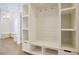 Well-organized mudroom featuring ample storage, shelving, and convenient hooks at 1301 Tawny View Ln, Raleigh, NC 27603