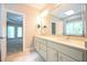 Bathroom with double vanity, tile flooring, and ensuite bathroom at 14 Whit Ct, Angier, NC 27501