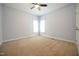 Bedroom featuring carpet, ceiling fan, and double windows at 14 Whit Ct, Angier, NC 27501