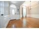 The front door opens to an elegant entryway that features hardwood floors and decorative moldings at 14 Whit Ct, Angier, NC 27501