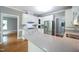 The kitchen has white cabinets, stainless steel appliances and a breakfast bar at 14 Whit Ct, Angier, NC 27501