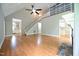 Open concept living area with high ceilings, staircase, and a view of the upper level loft at 14 Whit Ct, Angier, NC 27501