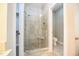Modern shower with glass door, bench and tile surround at 14 Whit Ct, Angier, NC 27501
