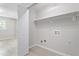 Unfinished basement laundry room with new floors and lots of possibilities at 1514 Goodwin Rd, Durham, NC 27712