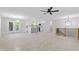 Open-concept living space with bright, modern finishes and an island kitchen with pendant lighting at 1514 Goodwin Rd, Durham, NC 27712