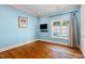 Bright bedroom featuring hardwood floors, natural light, and neutral paint at 16 Portofino Pl, Durham, NC 27707