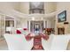 The foyer with soaring ceilings, arched doorways, and a grand staircase at 16 Portofino Pl, Durham, NC 27707