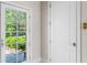 Hallway with a door to the backyard and a coat closet at 16 Portofino Pl, Durham, NC 27707