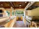 Outdoor kitchen and counter area with grill and ample counter space at 16 Portofino Pl, Durham, NC 27707