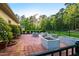 A quaint patio with concrete planters and manicured bushes at 16 Portofino Pl, Durham, NC 27707