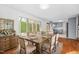 Dining room with hardwood floors and an attached kitchen is great for entertaining at 1751 Riverside Dr, Hillsborough, NC 27278