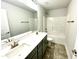Bathroom features double sinks, modern fixtures, and a tub-shower combination at 177 Kipling Creek Dr, Fuquay Varina, NC 27526