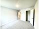 Bedroom includes carpet, closet, and neutral walls offering a versatile canvas at 177 Kipling Creek Dr, Fuquay Varina, NC 27526