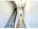 Bright entryway features hardwood floors, stairs, and access to the rest of the home at 177 Kipling Creek Dr, Fuquay Varina, NC 27526