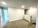 The open loft area features neutral carpeting and natural light at 177 Kipling Creek Dr, Fuquay Varina, NC 27526