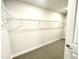 Walk-in closet with gray carpeting and wire shelving at 177 Kipling Creek Dr, Fuquay Varina, NC 27526
