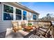 Outdoor deck with wooden furniture, perfect for relaxing and enjoying the view at 1805 Harrell Cove Ct # 180 Eldorado Fc, Fuquay Varina, NC 27526