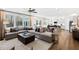 Spacious living room featuring hardwood floors, large windows, and comfortable seating at 1805 Harrell Cove Ct # 180 Eldorado Fc, Fuquay Varina, NC 27526