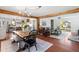 Open concept living and dining area with hardwood floors, natural light, and rustic decor at 1835 Pearidge Rd, Angier, NC 27501